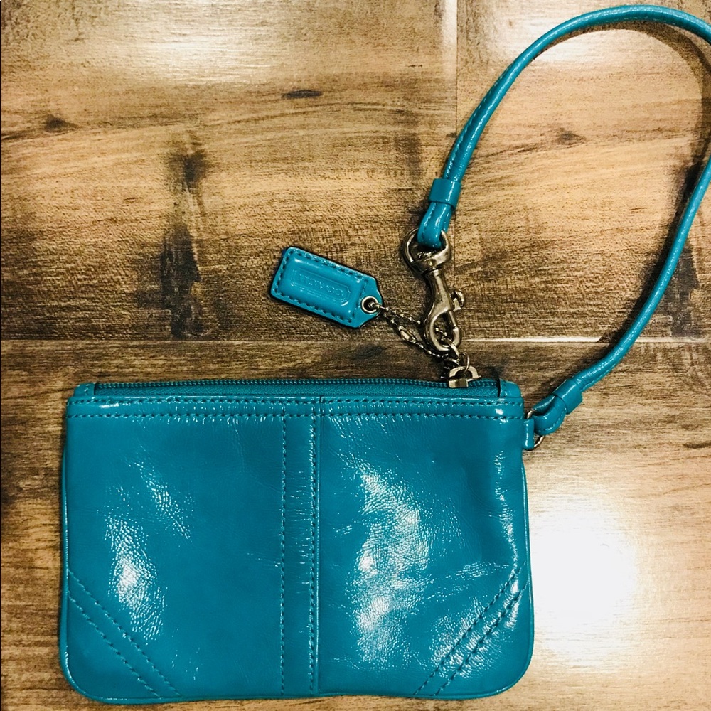 Peacock blue coach wristlet wallet